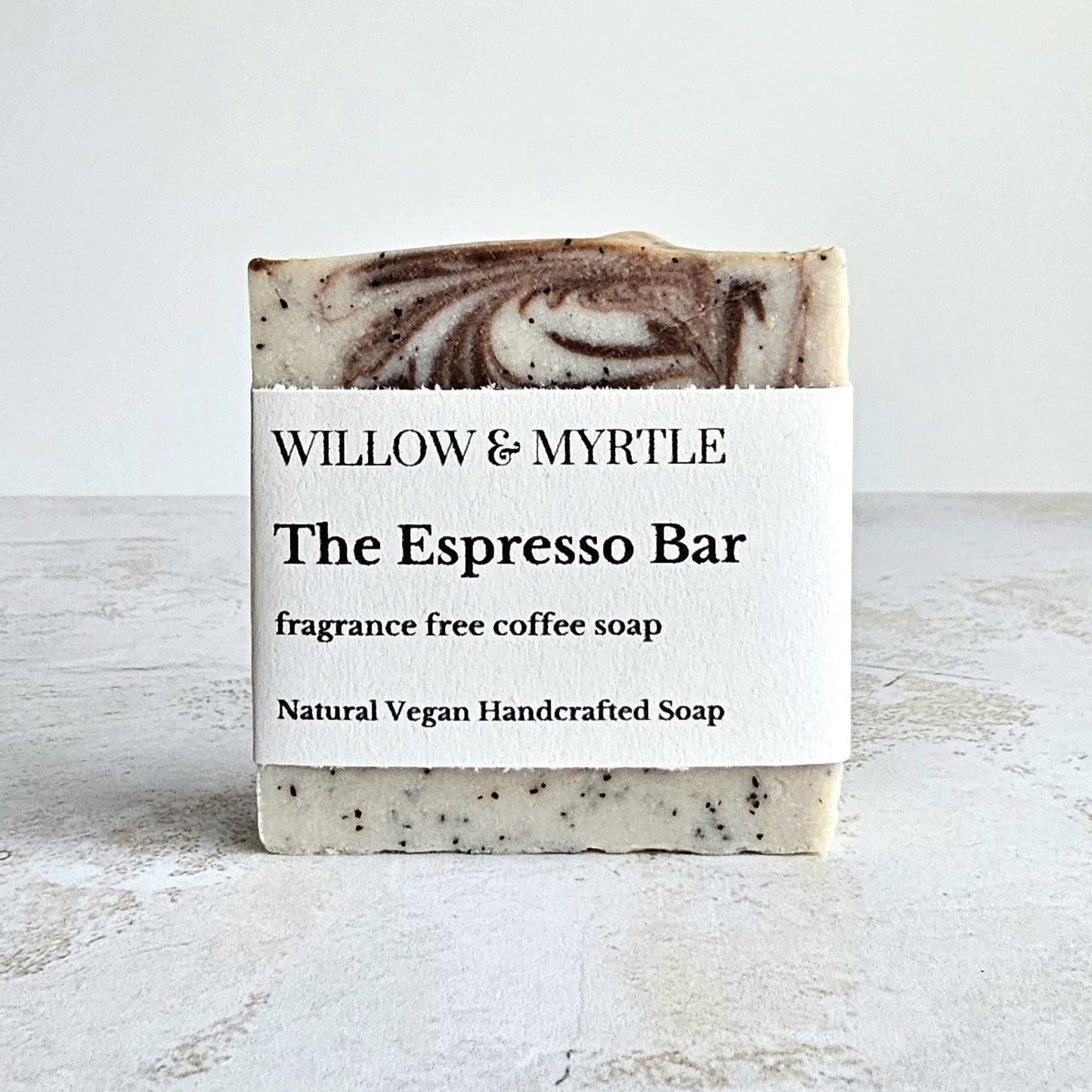 square soap with cocoa swirl and label