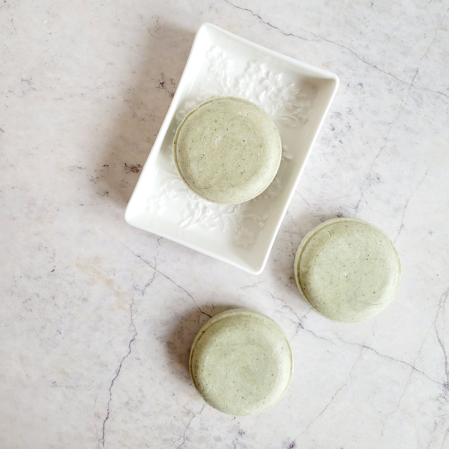 green shampoo bar, plastic free, round rosemary oil shampoo