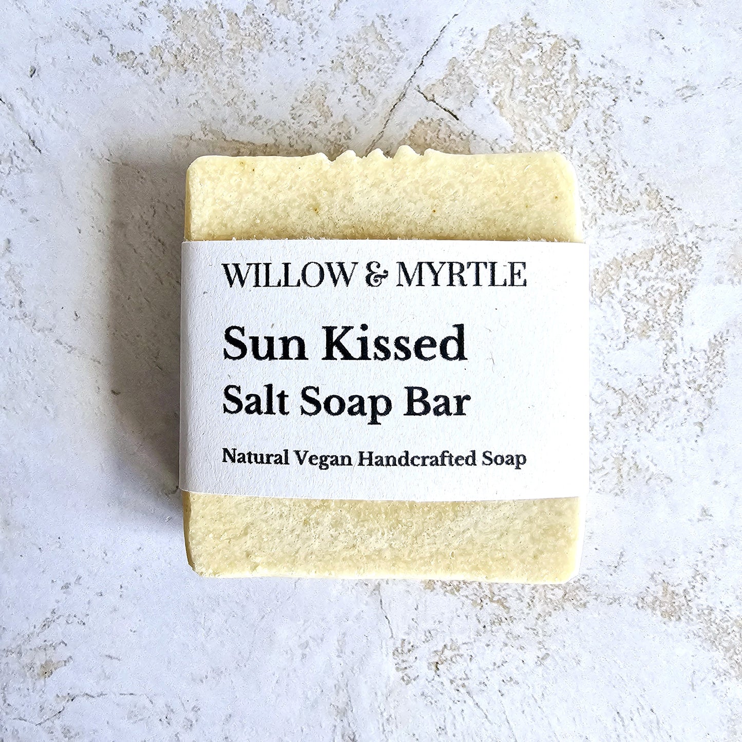 pale yellow salt soap with simple label in front