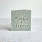 pale blue soap with specs of ground apricot stone.