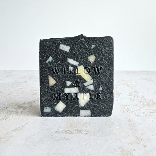 black charcoal soap with confetti design