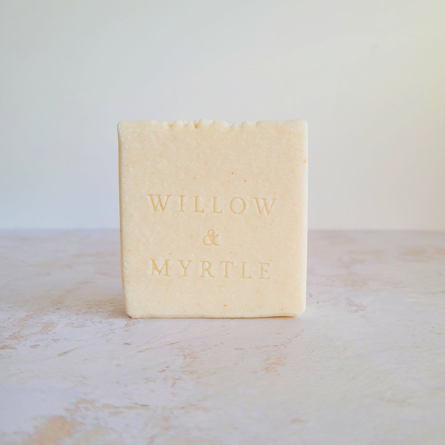turmeric salt soap. spa bar scented with lemongrass. square soap bar pale yellow